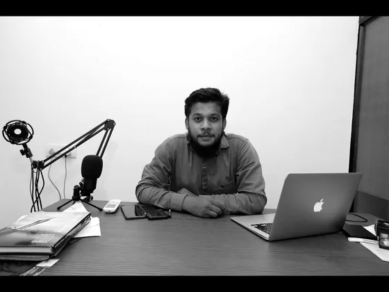 Mohammed Baleeq Ahmed, founder of Digital Mindster, at his desk